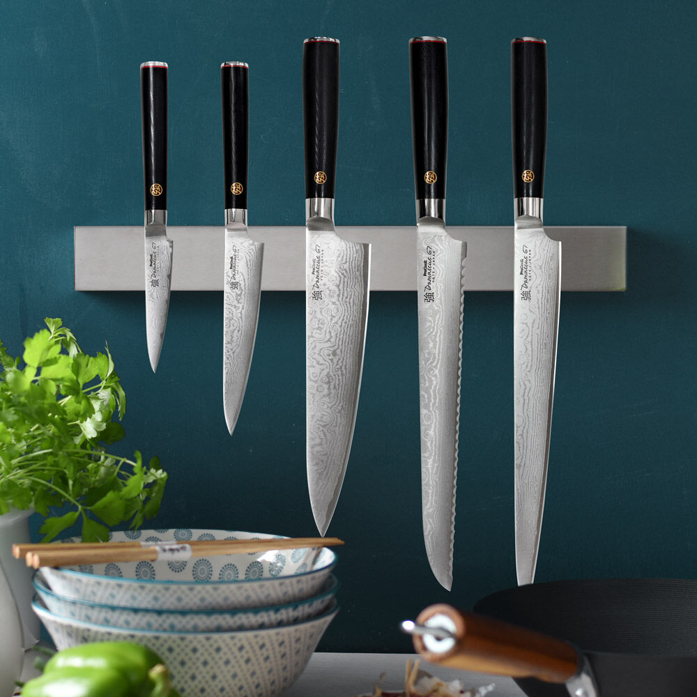 Image of ProCook Nihon X50 Knife Set placed against a stainless steel magentic knife rack