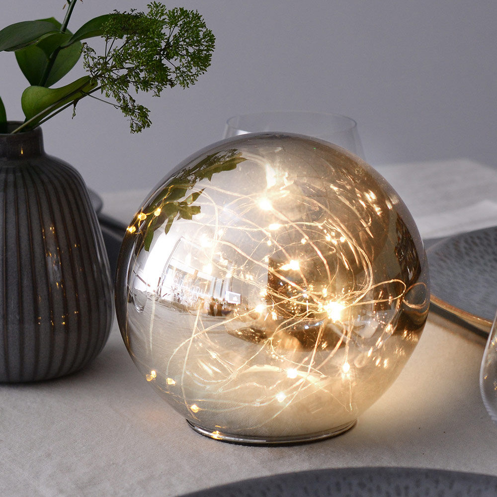 fairy lights in glass globe